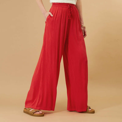 Pantalon large avec avec lastique rouge