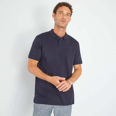 Polo en jersey uni relief Bleu marine