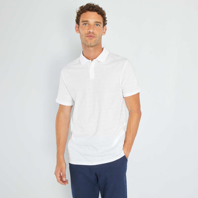 Polo en jersey uni relief blanc