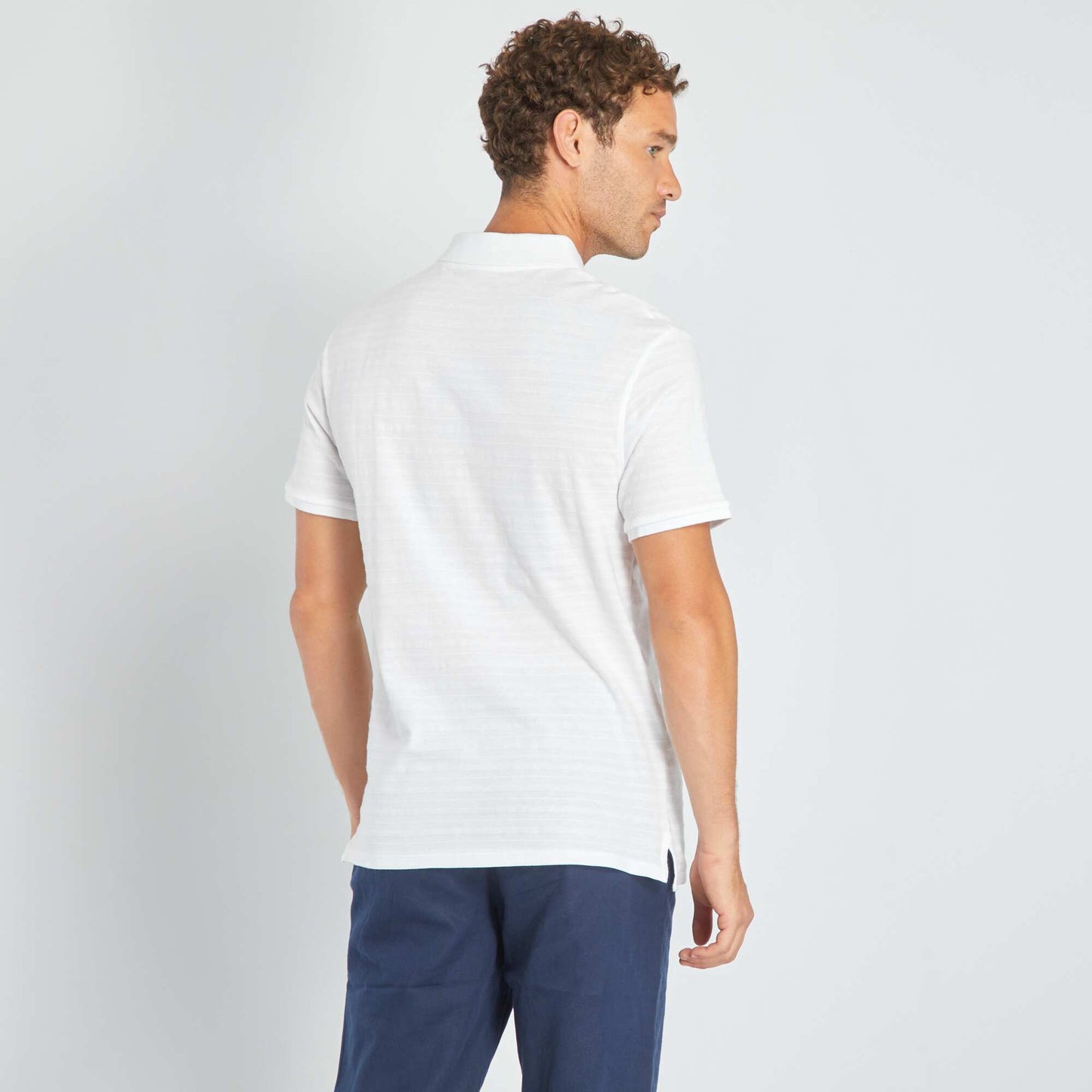 Polo en jersey uni relief blanc