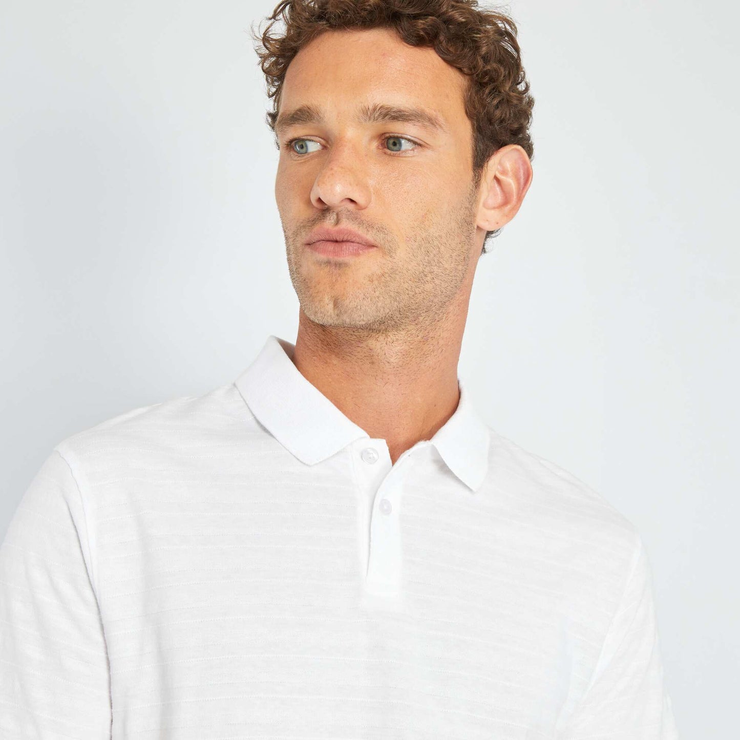 Polo en jersey uni relief blanc